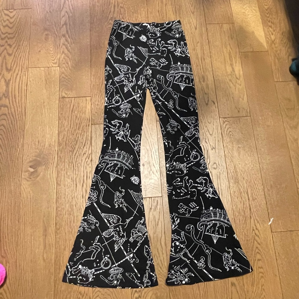 Black and white zodiac print flare pants